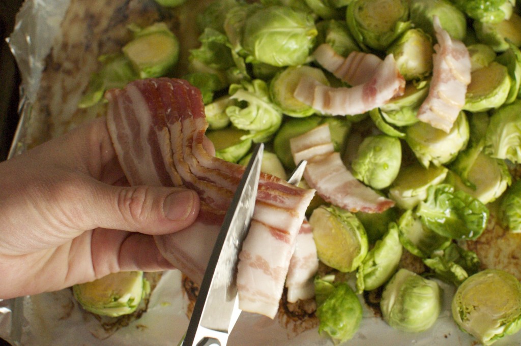 cutting bacon into brussels sprouts www.cubitsorganics.com